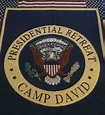 A close-up of a coin Description automatically generated with low confidence